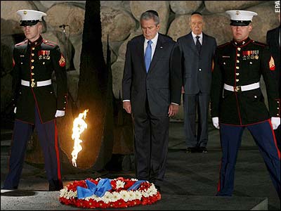 http://www.fpp.co.uk/online/08/01/images/Bush_at_Vashem.jpg